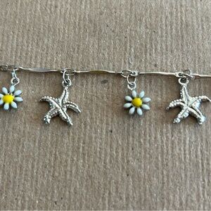 Silver Starfish and Daisy Charm Anklet
Pure Vida Brand